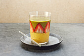 Colorful smoothie with banana, mango, spinach, and dates