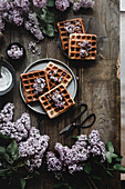 Waffles with lilac flowers