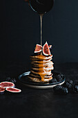 Gluten-free pancakes with figs and maple syrup