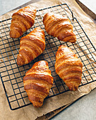 Croissants on a cooling rack