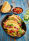 Vegetable tacos with beans, corn and avocado