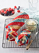 Rainbow cake roll with berries