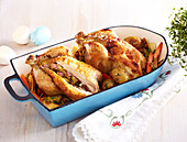 Baked Easter chicken with vegetables and smoked meat pudding