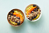 Golden milk bowl with persimmon, grapes and turmeric