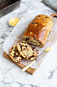 Raisin bread, sliced with butter