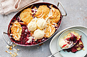 Berry and rhubarb compote with coconut dumplings