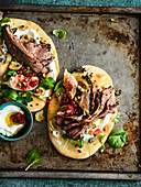 Shawarma flatbreads with grilled beef, sheep yoghurt and figs