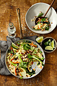 Fried risotto with lime, peanuts, edamame and egg