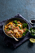 Fried rice with spring onion, ginger, coriander, corn and king prawns