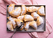 Vegan apple turnovers dusted with icing sugar