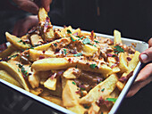 Loaded fries with bacon and cheese sauce