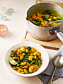 Healthy turmeric and ginger butterbeans with kale