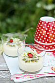 Elderflower panna cotta with pumpkin seeds and wild strawberries