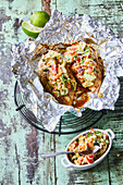 Chicken baked in foil with avocado salsa