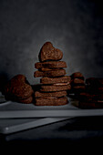 Heart-shaped chocolate biscuits filled with nut nougat cream