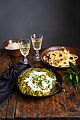 Chicken and spinach curry with naan