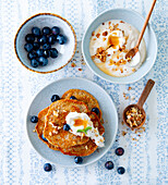 Pancakes with blueberries and honey-and-walnut cream