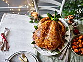 Brown sugar and spiced-glazed turkey with candied carrots