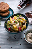 Potato salad with vegan meatballs