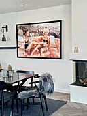 Dining area with large photo on the wall