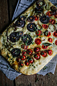 Focaccia with red onions and cherry tomatoes