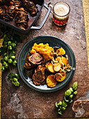 Beef roulades in Altbier sauce with pumpkin mash and fried potatoes