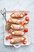 Cannoli with ricotta and strawberry filling