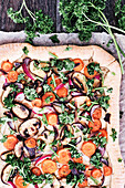 Vegan spelt crust pizza with vegetables