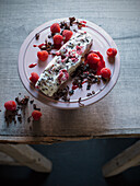 Stracciatella ice cream cake with raspberries