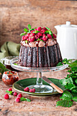Chocolate cream cake with raspberries