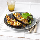Aubergine topped with goat's cheese and apricot crust