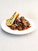 Tuscan braised beef served with crusty bread