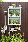 Wall mounted miniature greenhouse