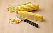 Corn cob with knife
