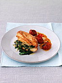 Pan-fried chicken stuffed with spinach and gruyere cheese