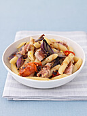 Penne pasta with tuna and roasted onion