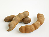 Three tamarind pods