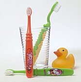 Glass and toothbrushes