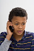 Boy using a mobile phone