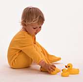 Girl with yellow ducks