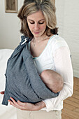 Woman with baby in sling