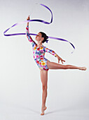 Girl doing rhythmic gymnastics