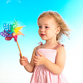 Girl holding a windmill