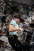 NASA wearing a virtual reality headset on the ISS
