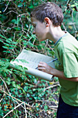 Boy going on nature hunt