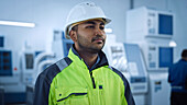 Worker wearing a safety jacket