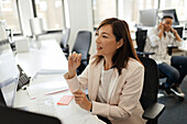 Businesswoman working at computer in office