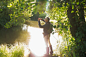 Man fly fishing at a river