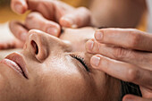 Thai facial massage