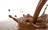 Liquid chocolate crown splash with pour stream, illustration